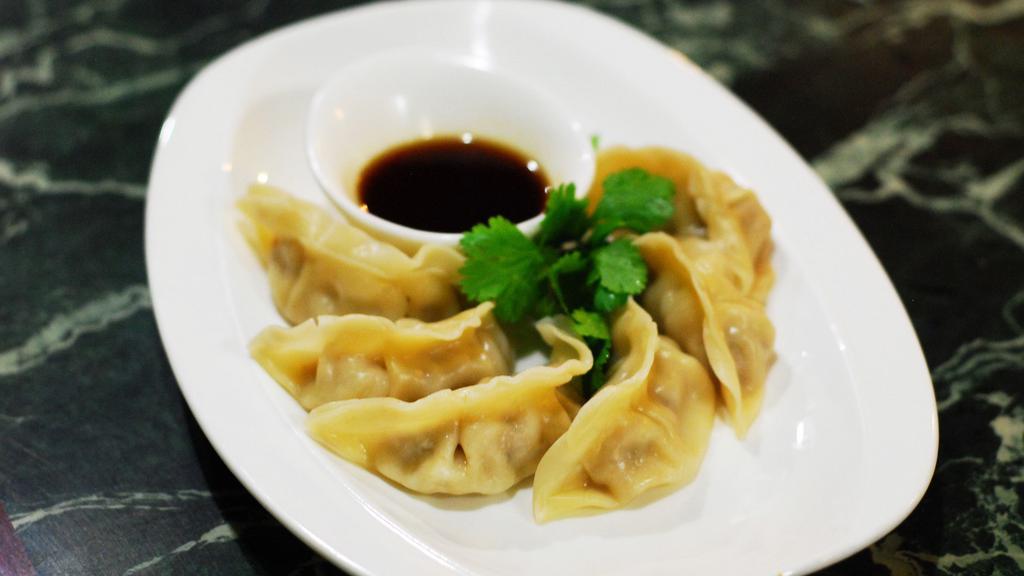 Steam Potsticker · 6 pieces, pork, vegetable, and dipping ginger-soy sauce