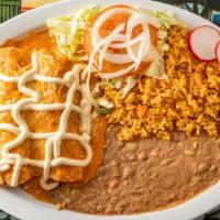 Enchiladas · 2 Pieces. Served with rice and beans.