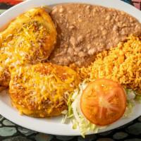 Chiles Rellenos · 2 pieces. Served with rice and beans.