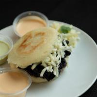 Domino Arepa · Delicious mix with fried black bean  and mozzarella cheese