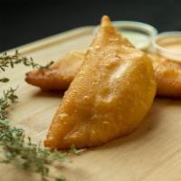 Domino Empanada · An empanada breakfast, lunch, dinner or snacks,  is an experience that is best enjoyed with ...