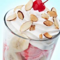 Upright Banana Split · VANILLA, CHOCOLATE, AND STRAWBERRY ICE CREAM LAYERED WITH BANANAS CHOCOLATE SAUCE, STRAWBERR...