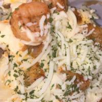 Shrimp Alfredo Potato · Baked potato topped with grilled shrimp, creamy alfredo sauce, mozzarella cheese, and fresh ...