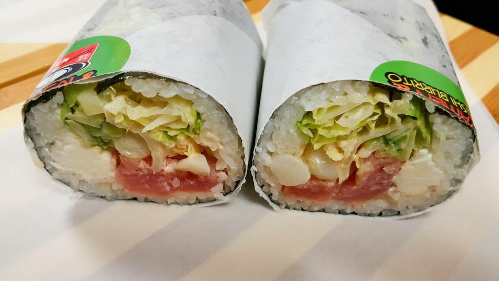 M.G. Sushi Burrito · Sushi rice, shrimp, scallop, lettuce, spicy tuna, sesame seeds, cream cheese, avocado, cucumber, spicy mayo.

Contains raw fish.
Consuming raw or undercooked meats, seafood, shellfish or eggs may increase your risk of food borne illness.