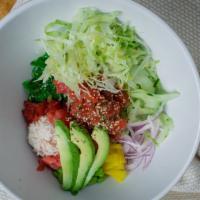 Tuna Poke Bowl · Tuna, sushi rice, crab salad, cucumber, avocado, sweet pickled radish, seaweed salad, edamam...