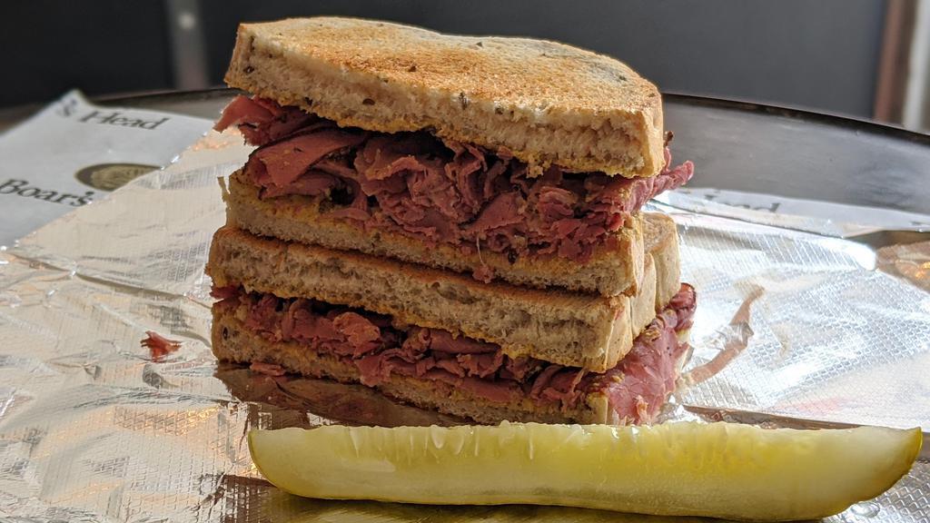 Hot Pastrami Classic Sandwich · 1/4 lb. Pastrami and spicy brown mustard served hot on toasted Jewish rye bread. Served with a pickle spear.
