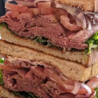 Roast Beef Sandwich · 1/4 lb. Roast beef, green leaf, Roma tomato, red onion, and mayonnaise. Your choice of bread...