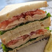 Chicken Sandwich · 1/4 lb. sliced chicken breast, green leaf, Roma tomato, red onion, and mayonnaise. Your choi...