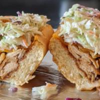 Bonnie & Clyde Sandwich · 1/4 lb. Sliced chicken breast, chopped bacon, Cheddar, BBQ sauce, fried onion, topped with c...