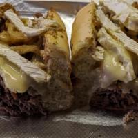 Clair Sandwich · 1/4 lb. Au-jus soaked Italian roast beef, brie cheese, fried onions, and Dijon mustard. Serv...