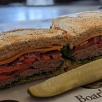 Dillinger Sandwich · 1/4 lb. Italian roast beef, Cheddar, green leaf, Roma tomato, red onion, cracked pepper, and...