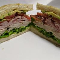 Jack Dragna Club Sandwich · 1/4lb. Turkey, 1/4 lb. smoked ham, bacon, avocado, Swiss, green leaf, Roma tomato, red onion...
