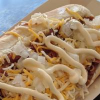 Dirty White Boy Dog · Hot dog chili, chopped bacon, shredded Monterey Jack cheese, freshly diced white onion, and ...