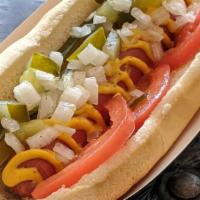 Chicago Dog · Yellow mustard, fresh Roma tomato slice, pickle spear, diced white onion, freshly chopped pi...