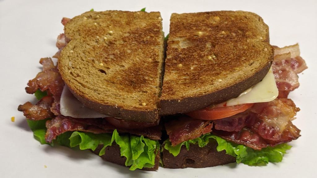 Blt Sandwich · Boar's Head bacon, green leaf lettuce, Roma tomato, and mayonnaise on your choice of toasted bread.