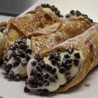 Cannoli · Italian pastry with a light flakey fried shell, filled with sweet creamy Ricotta and Mascarp...