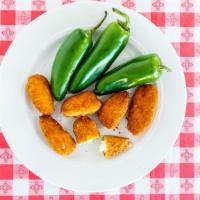 Chili Poppers · Jalapeño peppers stuffed with cheddar cheese.