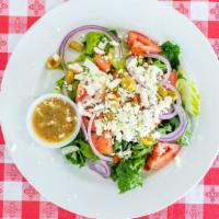Greek Salad · Crispy lettuce, tomatoes, onion rings, green olives, shredded cheese, olive oil.