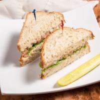 Boston Tuna Sandwich · Our fresh house made tuna salad, lettuce, tomato, alfalfa sprouts, and mayo served on our mu...