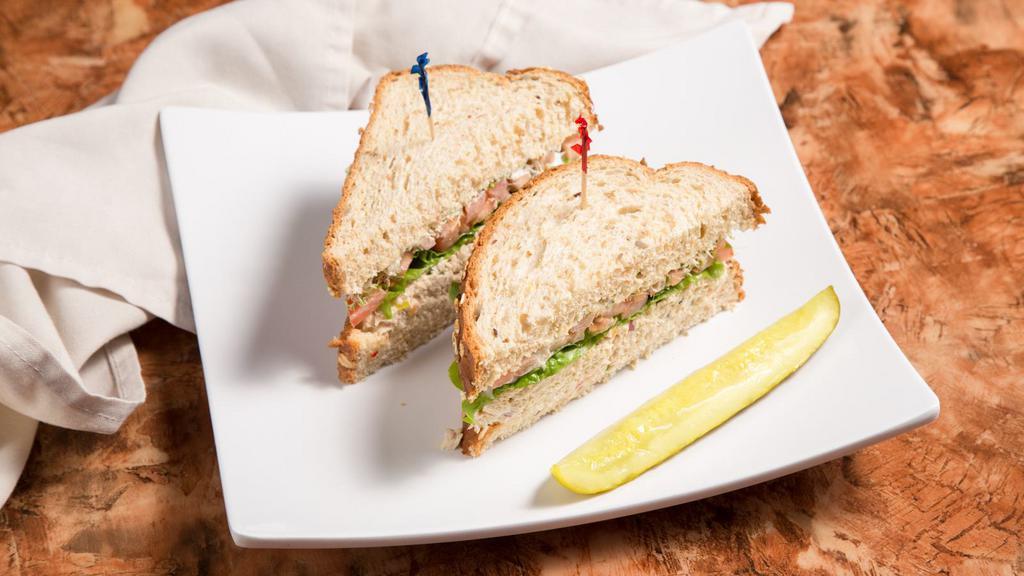 Boston Tuna Sandwich · Our fresh house made tuna salad, lettuce, tomato, alfalfa sprouts, and mayo served on our multigrain sandwich bread with a pickle spear.