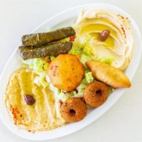 Veggie Platter · The ultimate sampler of hummus, baba ghanoush, potato cake, boorak, two pieces of falafel an...