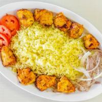 Chicken Kebab · Two (2) skewers of marinated chicken, char-broiled to perfection, served with rice, fresh sl...