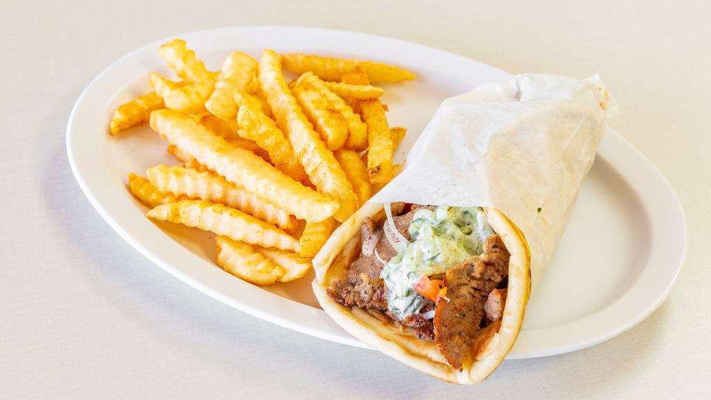 Gyro Sandwich Combo · Good Fellas Grill favorite: Slices of rotisserie gyro meat served on pita bread with fresh slices of tomatoes, onions and tzatziki sauce.