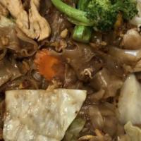 Phad See Iew · Stir fried wide noodles with egg, broccoli, cabbage, carrots and Thai soy sauce.