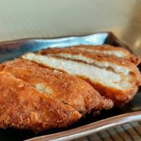 Tonkatsu · Panko breaded pork loin cutlet.  Perfect addition to our curry udon or curry rice bowl.
