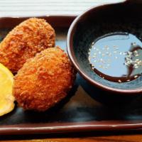 Kani-Cream Croquettes (2 Piece) · House-made crunchy panko breaded croquettes filled with a creamy and decedent mixture with i...