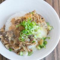 Gyudon (Beef Rice Bowl) · Steamed white rice topped with our sukiyaki style beef and onions.