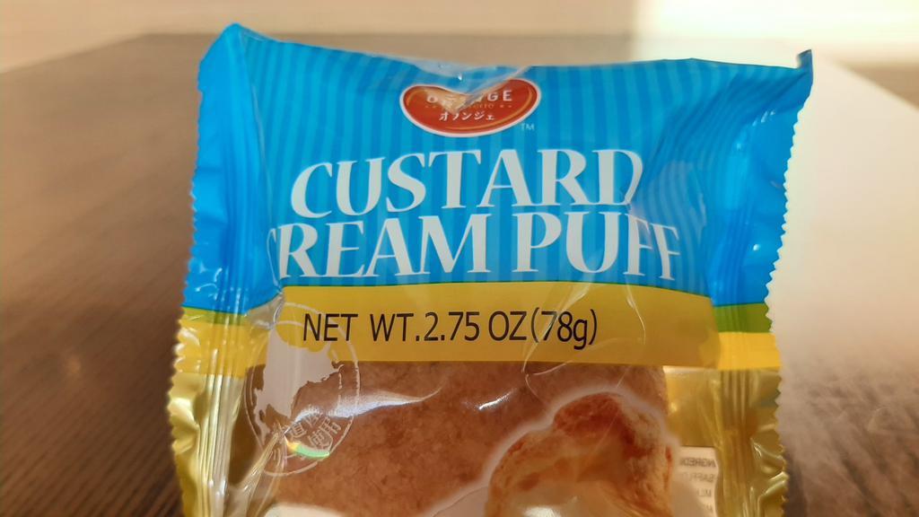Jumbo Cream Puff · Jumbo custard cream filled cream puff.