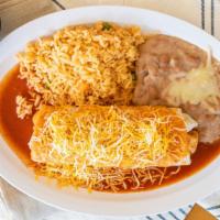 Wet Super Burrito · Smothered in red sauce & topped with cheddar. Inside: rice, beans, lettuce, pico de gallo, y...