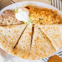 Super Quesadilla · Flour tortilla filled with melted cheddar cheese & your choice of meat. Served with salad, s...