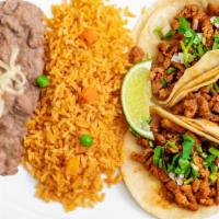 Taco Combo · 3 soft tacos topped with fresh cilantro & onion, served with rice and beans at the side ✻ sa...