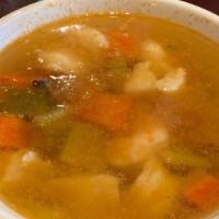 Caldo De Camaron · Delicious shrimp soup made with potatoes, carrots, and zucchini, flour or corn tortillas.
