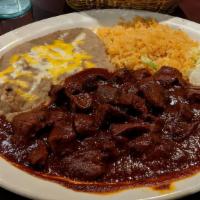 Chile Colorado · Chunks of pork cooked in a New Mexico dry red chile sauce.