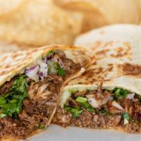 Birria Quesadilla · Flour tortilla with melted Monterey Jack cheese, shredded beef, diced red onion and cilantro.