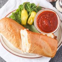 Chicken Parmigiana Sandwich · Served with side of meat sauce.