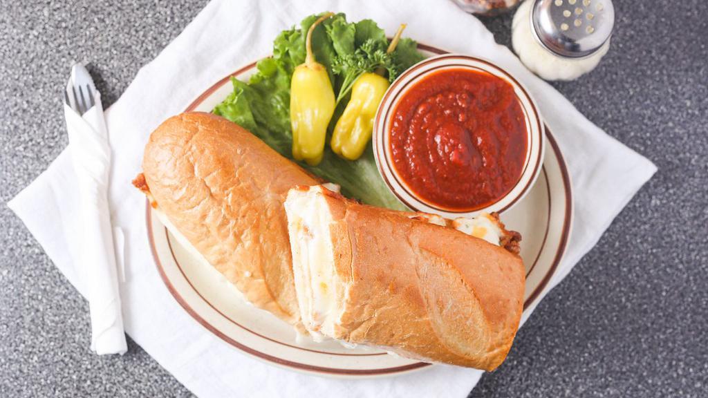 Chicken Parmigiana Sandwich · Served with side of meat sauce.