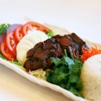 Lok Lac · Tender beef steak cubes. Marinated steak cubes with garlic, cracked black peppers, and house...