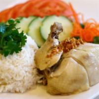 By Meurn · Gluten-free. Garlic chicken rice. Herb boiled chicken served over jasmine rice cooked in chi...