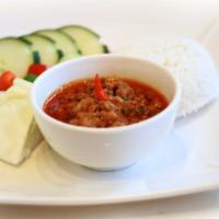 Pra-Hok Ktiss · Ground pork and salty fish dip served with an assortment of fresh vegetables.