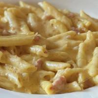 Mac & Cheese · Prosciutto, shallots, and garlic. all mixed into a creamy parmesan sauce and topped with tru...