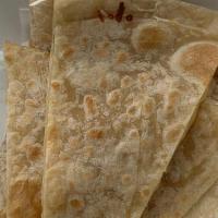 Quesadilla · Fourteen inch tortilla folded and stuffed with cheese.