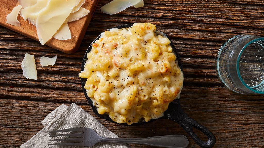 Truffle Mac & Cheese · Mac and cheese with Parmesan and truffle oil.