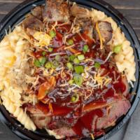 Ultimate Bbq Mac & Cheese · Mac and cheese with grilled chicken, tender brisket, smoked pork, sliced scallions, and BBQ ...