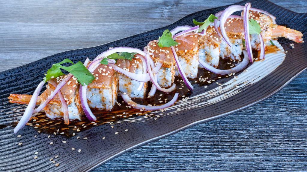 Spicy Albacore Roll · Raw. Spicy crab mix inside and topped with albacore, onions and spicy ponzu sauce.