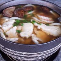 Udon Soup With Chicken · Udon noodles served with grilled chicken breast with original dashi broth, topped with fishc...
