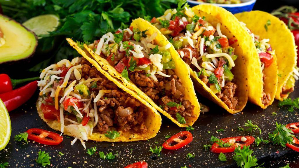 Beef Taco · Hard shell taco full of fresh beef, lettuce and cheese.
